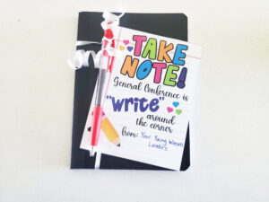 LDS General Conference reminder with journal and pen