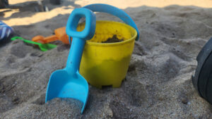 Shovel and bucket on the beach