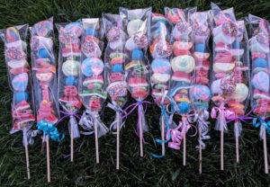 Row of kabobs filled with gummy candies