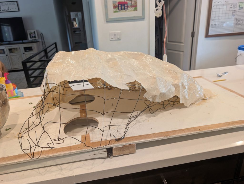 Covering the nose with paper mache