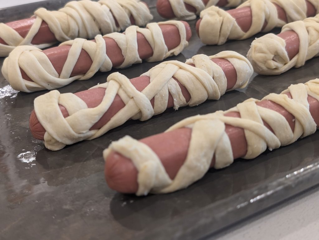 Hot dogs wrapped in crescent dough