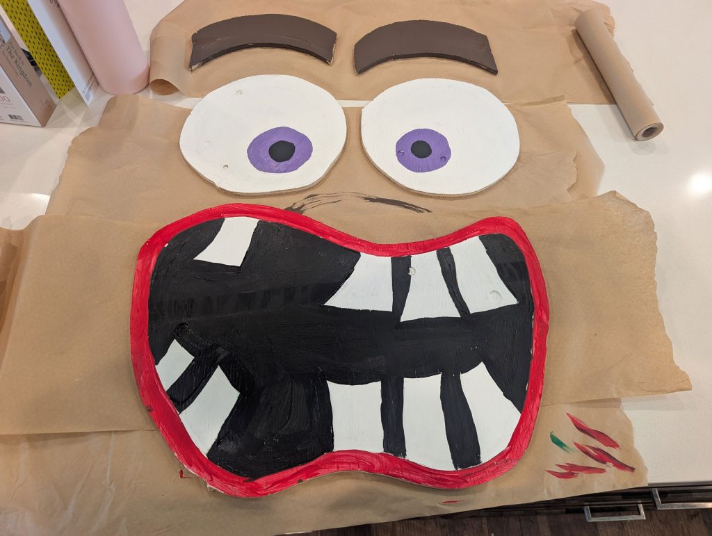 Remaining pieces of the face ready to be attached to the game