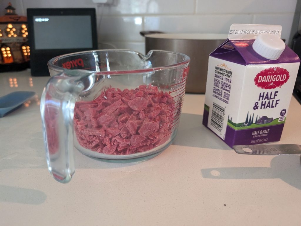 Combine red candy melts and half and half for the dripping blood layer
