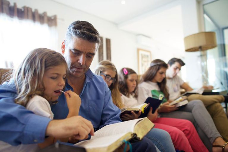 Family studying the scriptures