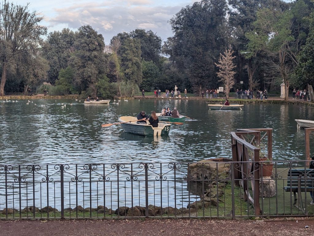 People paddling around on Villa Borghese Lake