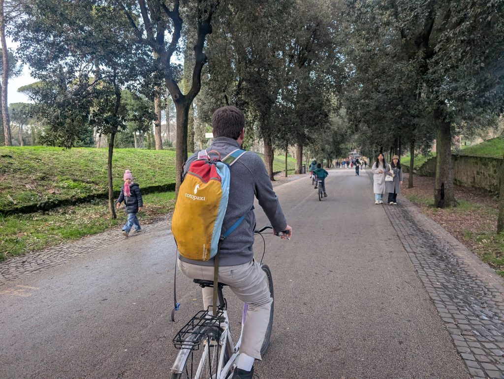 Pay five euros to rent a bike at Villa Borghese