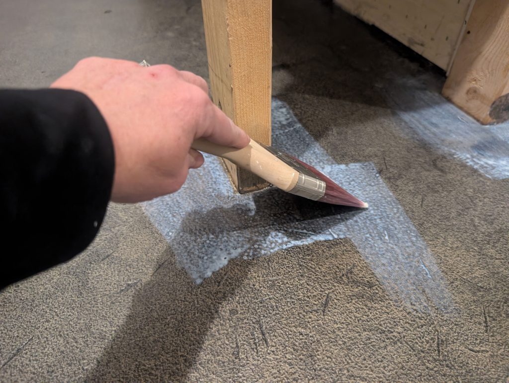 Applying concrete bonding primer to the edges