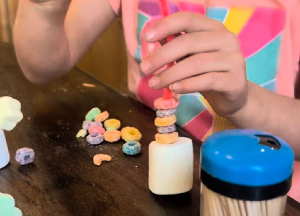 Thread fruit loops onto the pipe cleaner