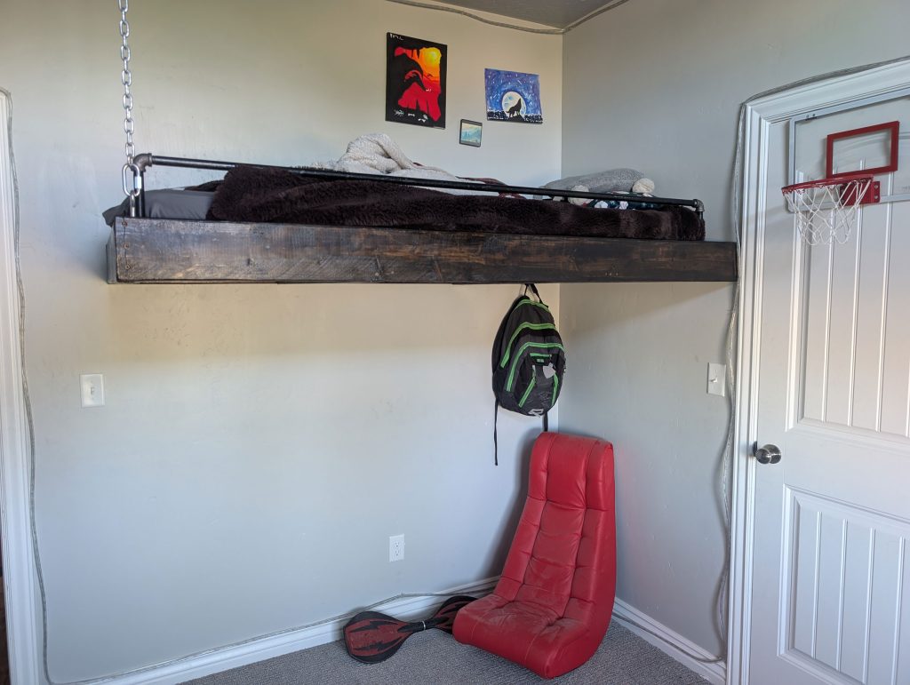 My son's DIY floating loft bed