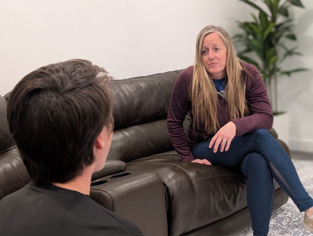 Mother talking to her son