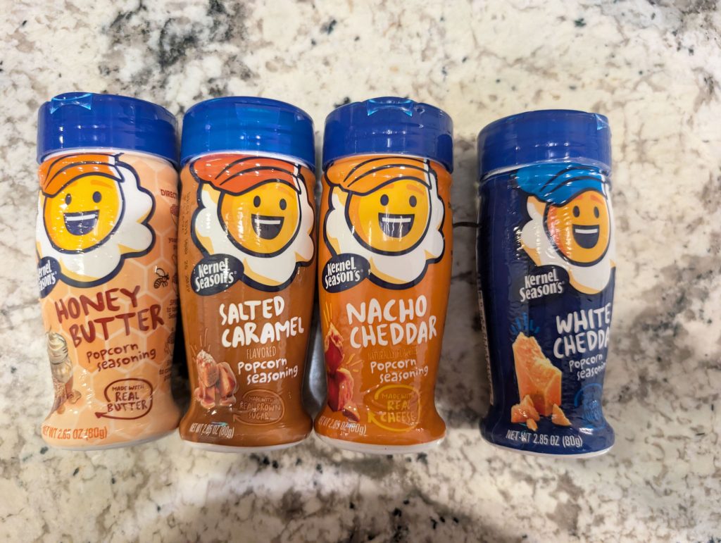Four different popcorn seasonings
