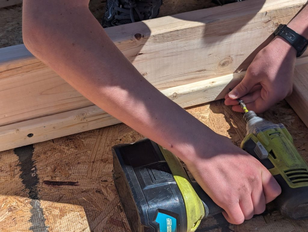 Screwing drywall screws into inner frame