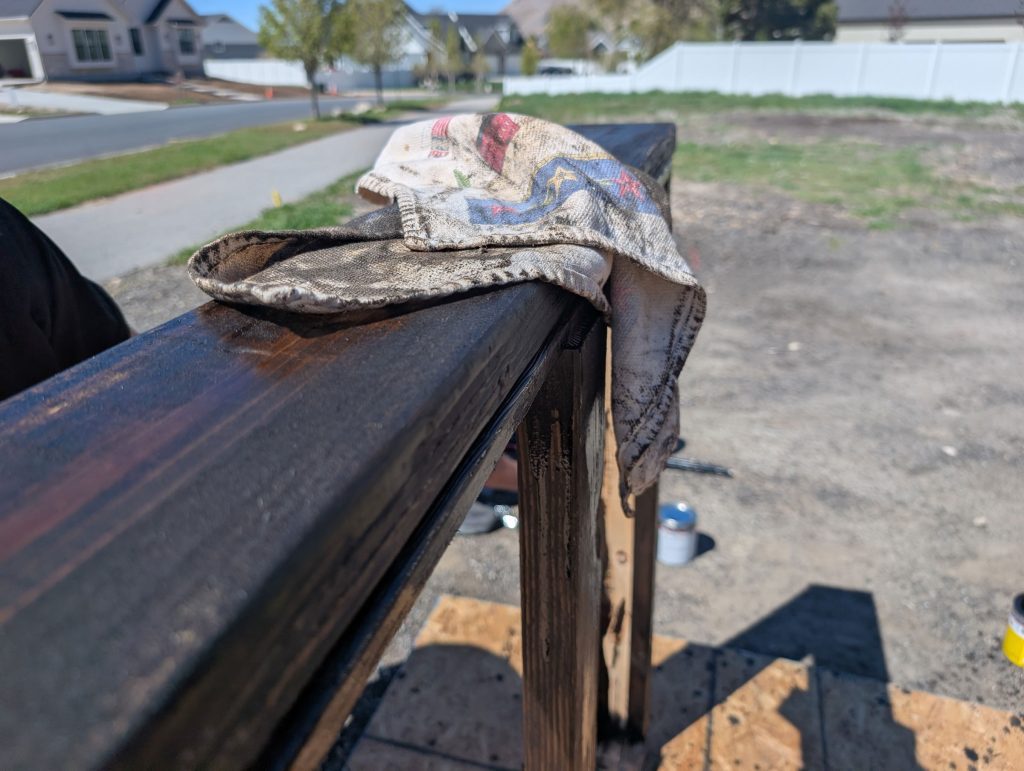 Stain and wipe the frame with wood stain