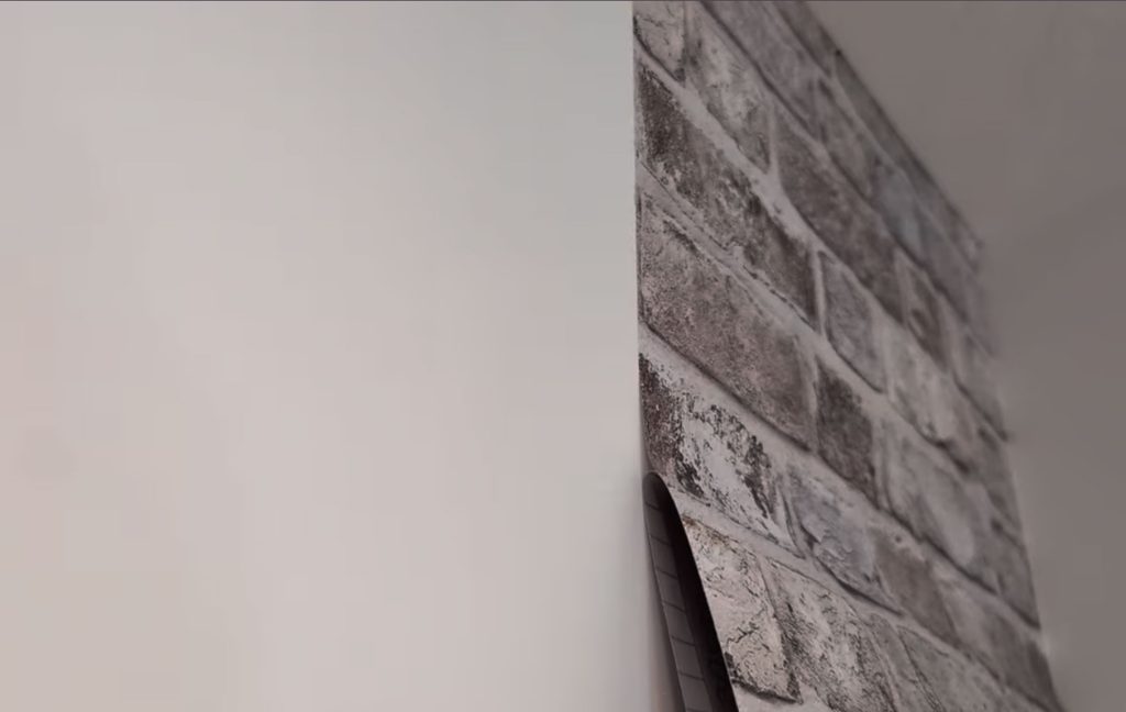 Peel the wallpaper backing as you go