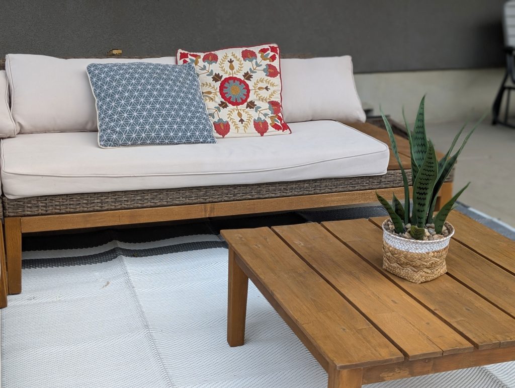 Plants and throw pillows add a lot to a patio