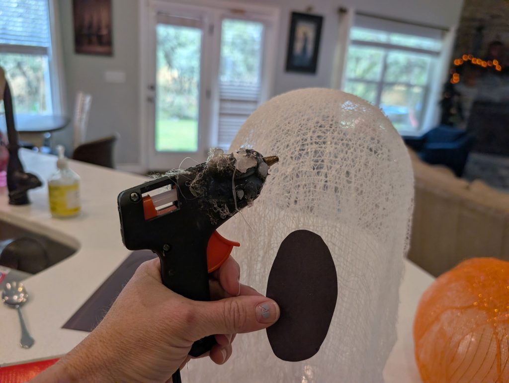 Gluing the mouth to the ghost